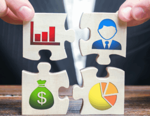 Pièces de puzzle représentant les éléments clés d’une entreprise : finances, ressources humaines, statistiques et stratégie.